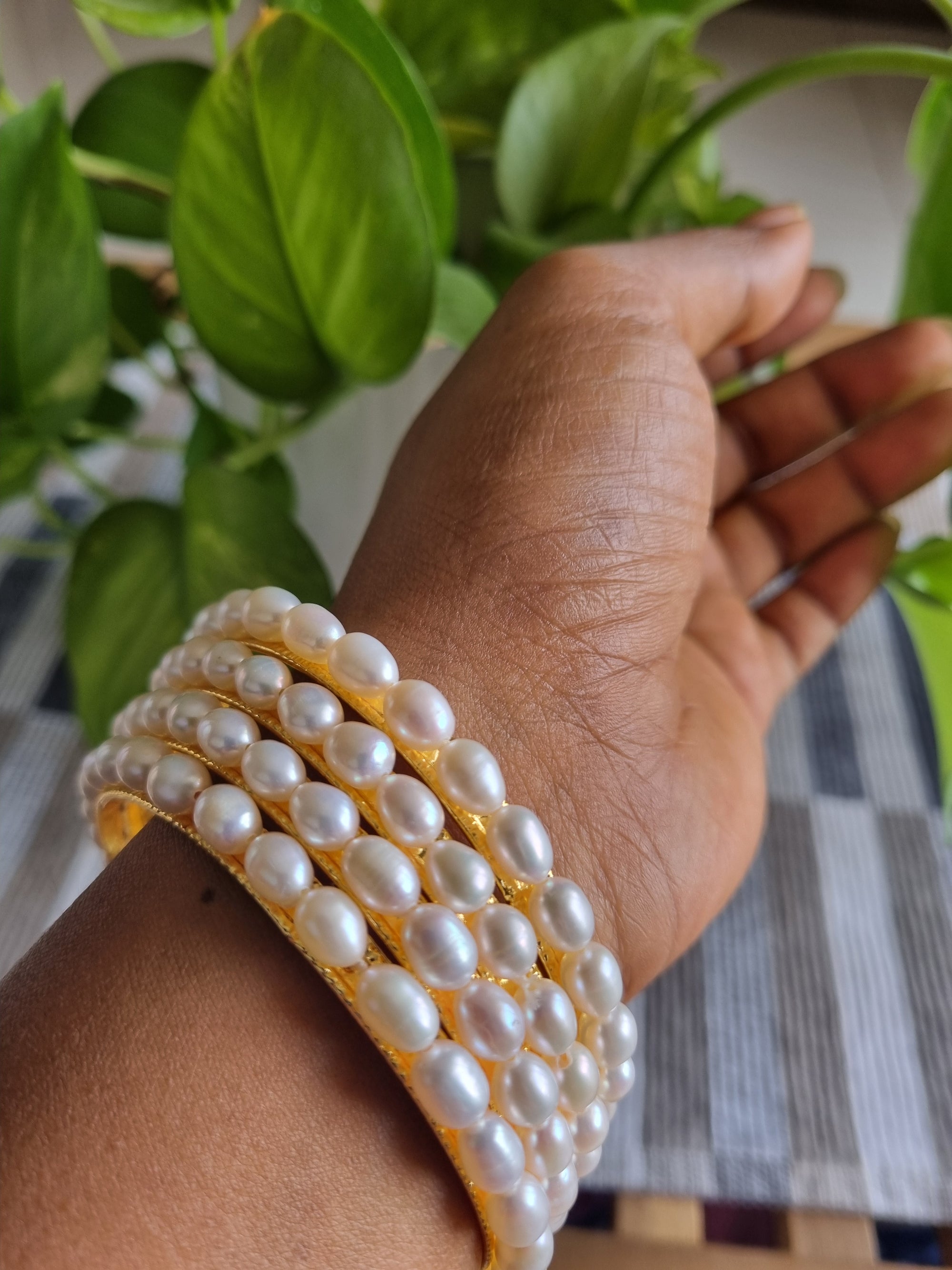 white oval pearl bangles pair of four