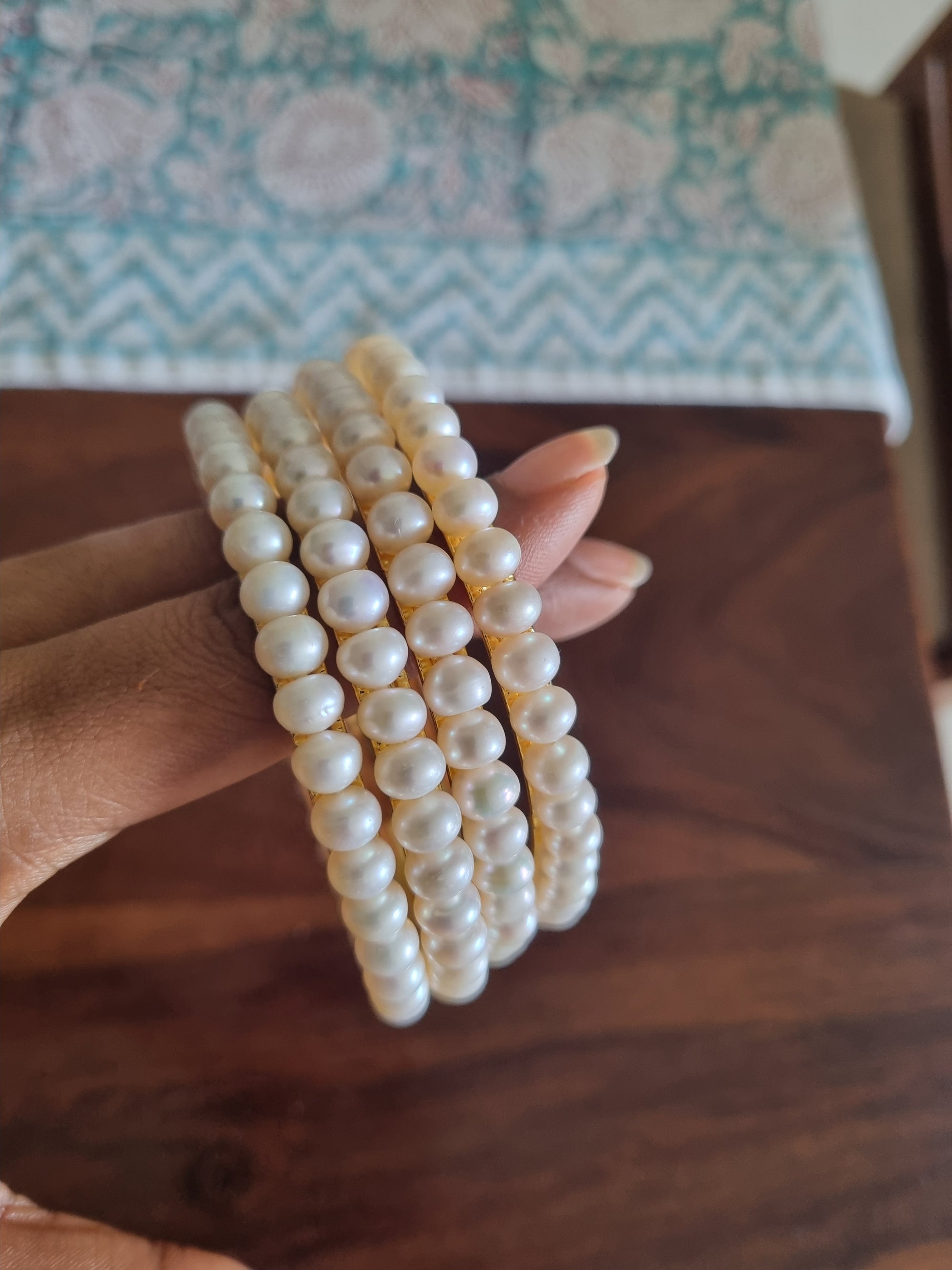 White semi round pearl bangles - pair of four